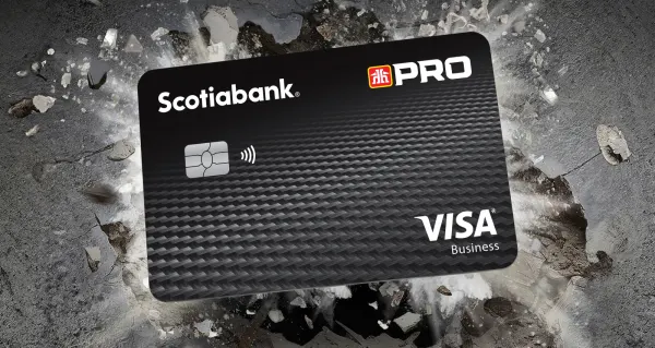 The Scotia Home Hardware PRO Visa Business Card set on a background of exploding rocks.