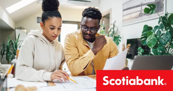 A young couple visiting a Scotiabank Home Financing Advisor.